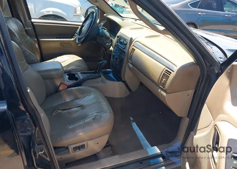 2002 Jeep Grand Cherokee Laredo z USA, uszkodzony, nr VIN 1J4GW48S82C132199